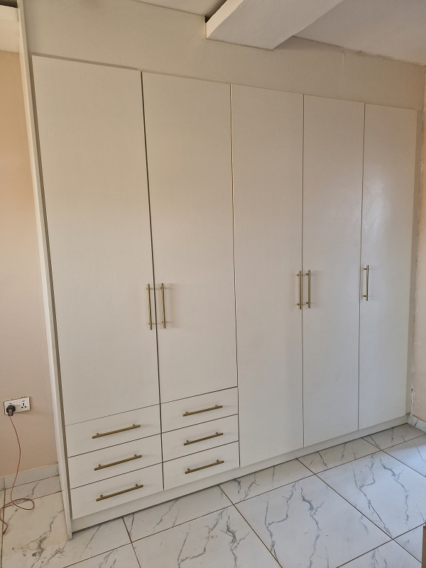 Built-in wardrobe design by Engwave Kitchens